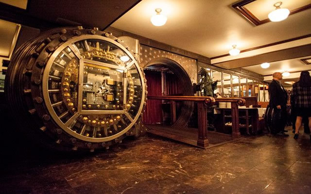 Vault door securing stored high-value assets